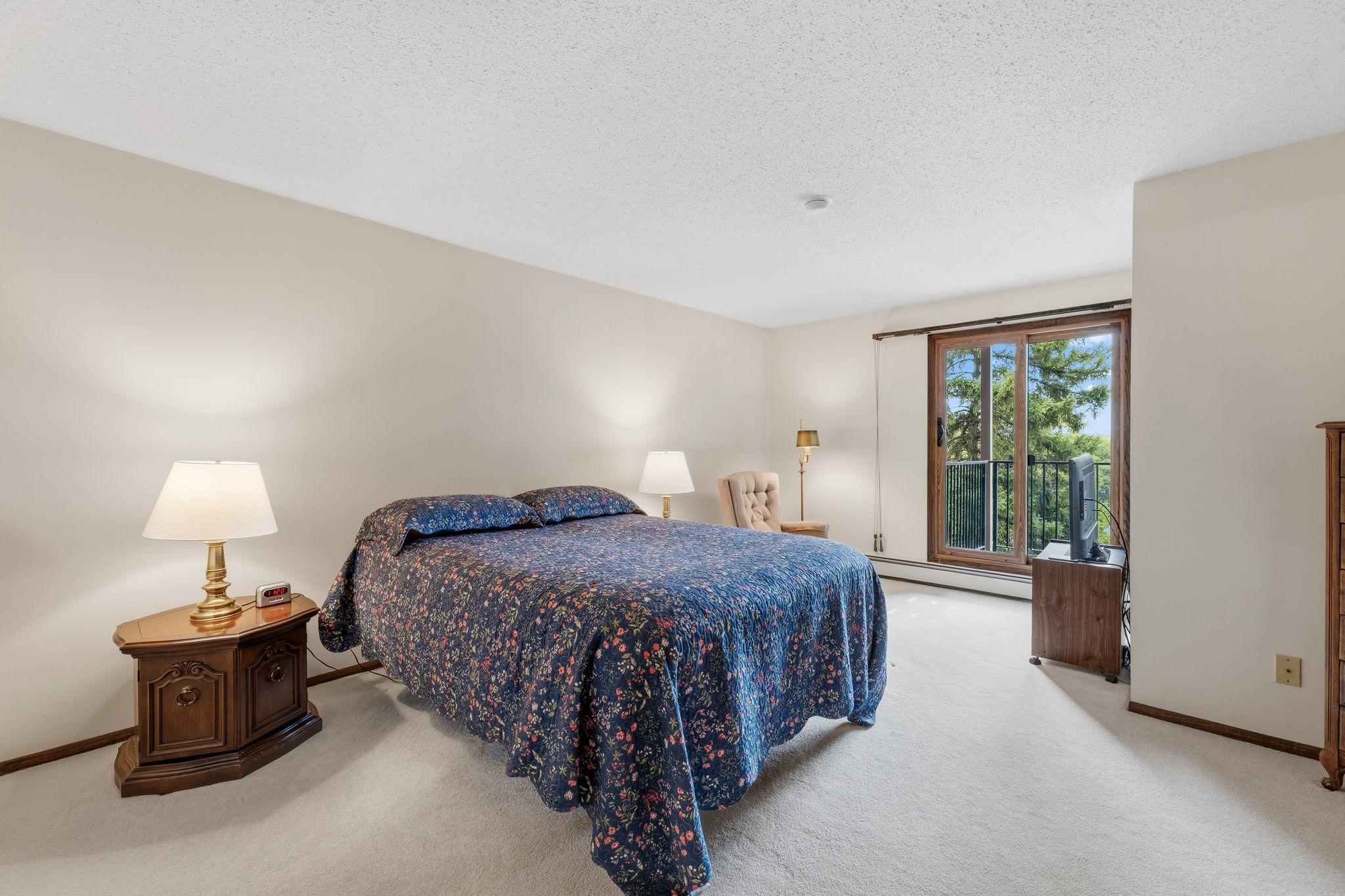The spacious primary bedroom