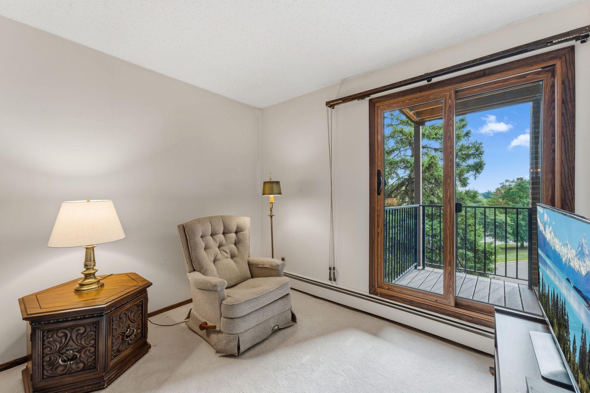 The primary bedroom features a private deck.