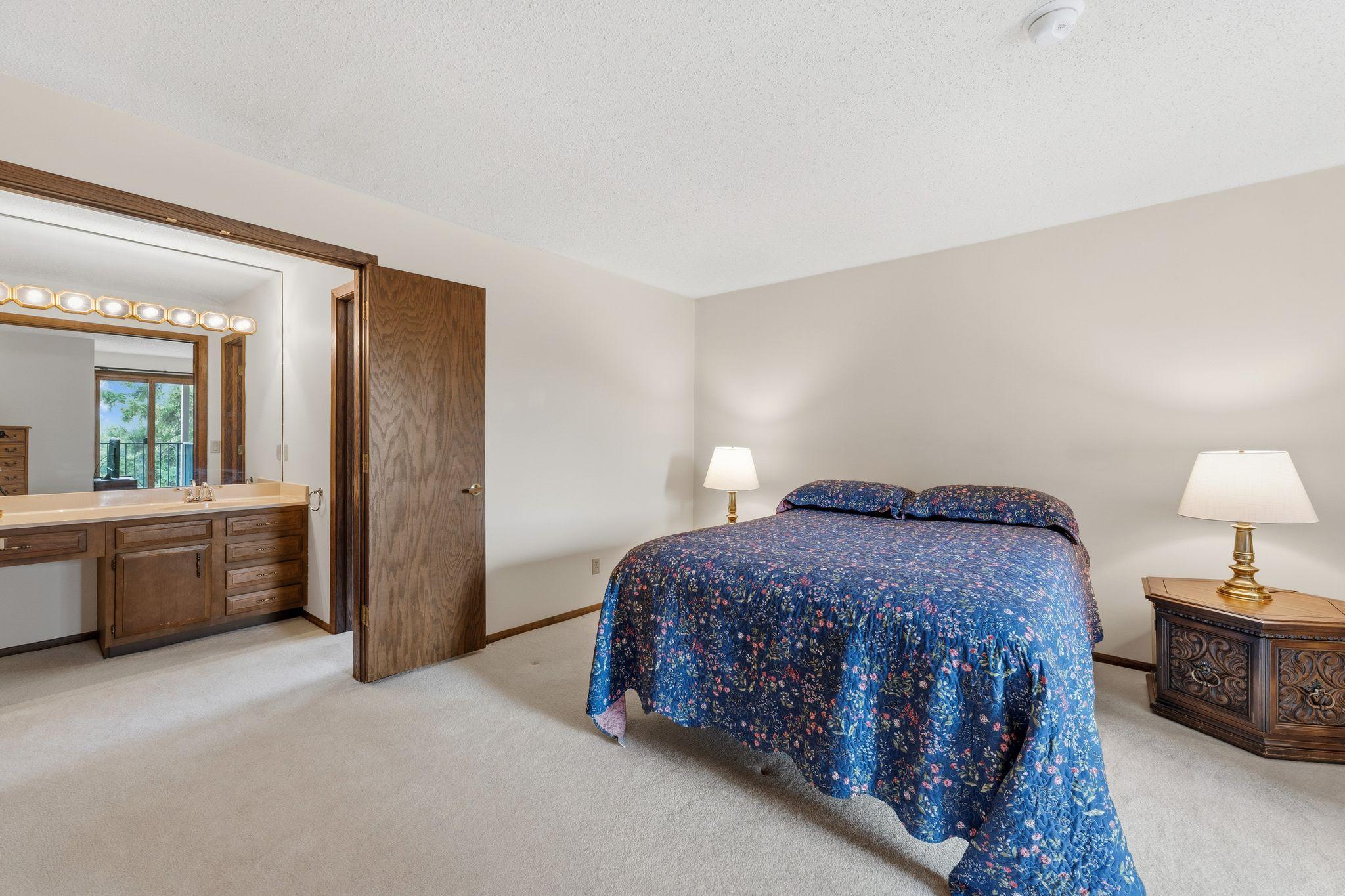 The primary bedroom suite features a 3/4 bathroom and walk-in closet