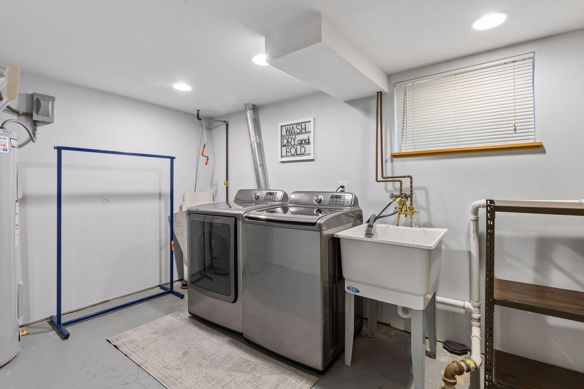 Laundry is located in the lower level. Functional space & utility sink you'll appreciate.