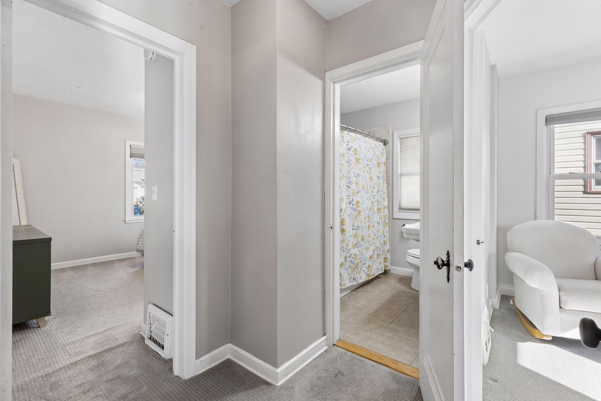 Hallway in main level near bedrooms & full bath.