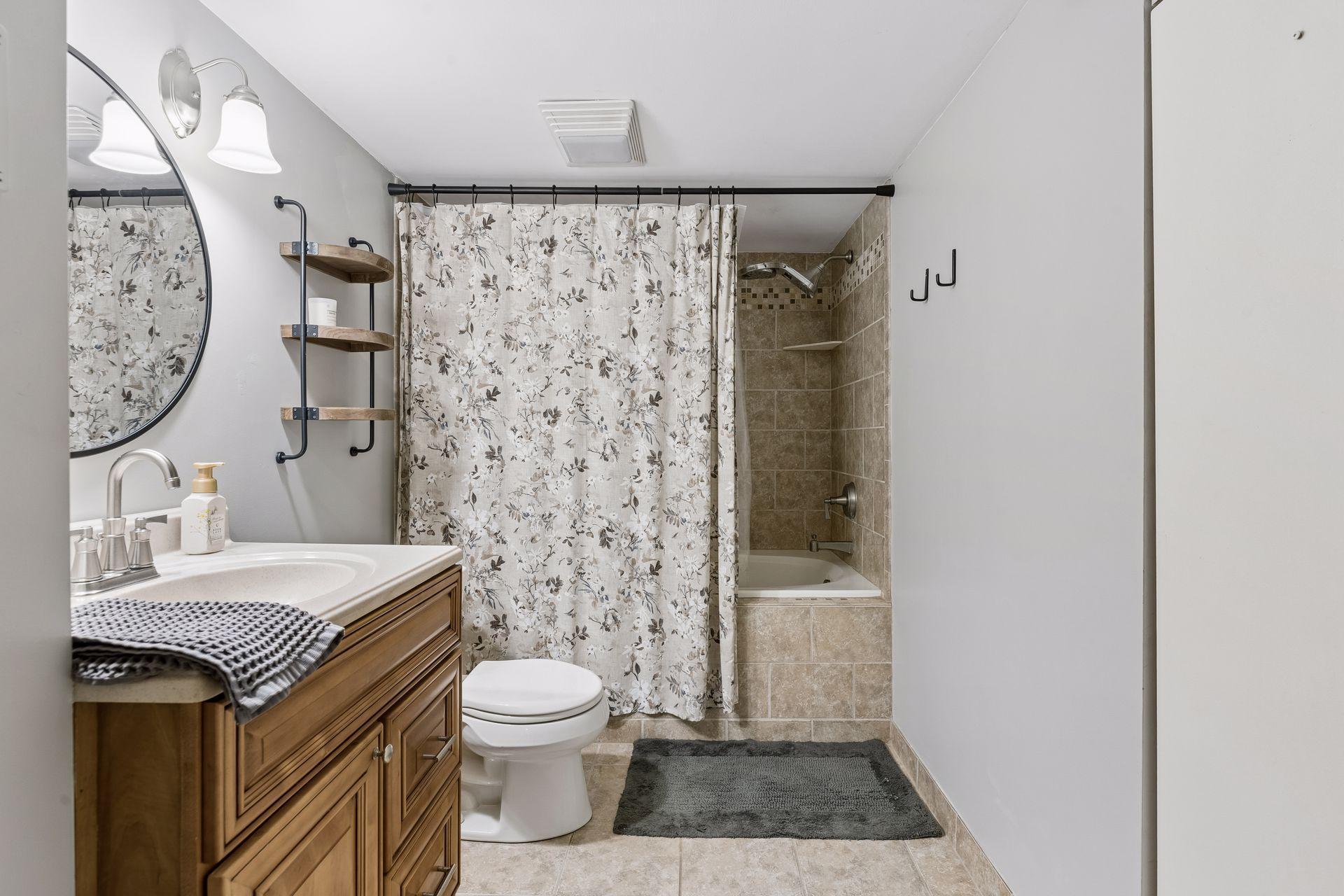 Lovely full bath in the lower level with jetted tub & shower!