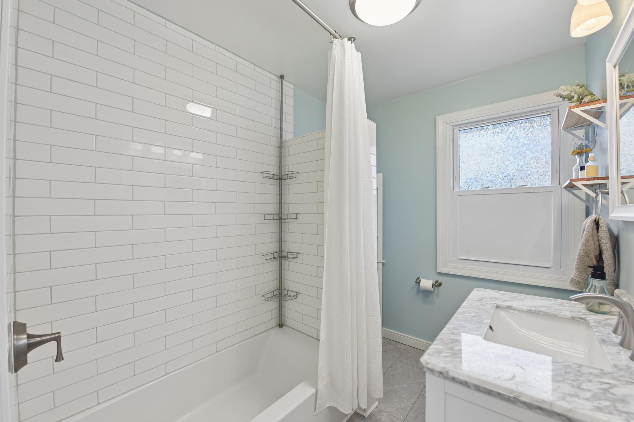 Completely remodeled main floor full bathroom.
