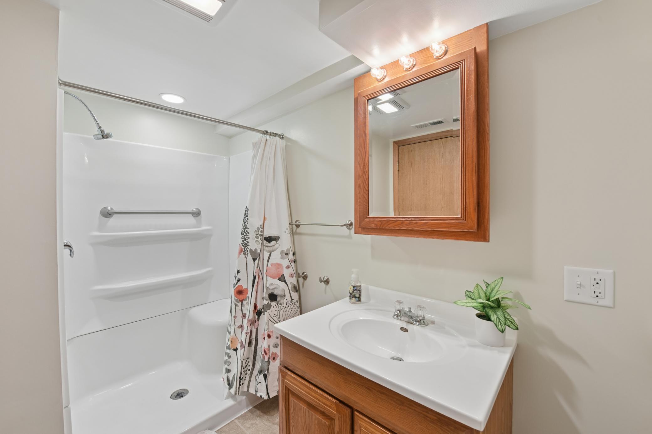 Updated lower level 3/4 bath.