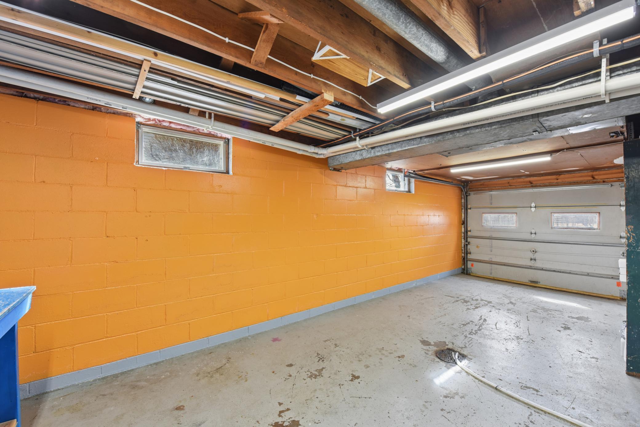 Attached tuck under garage for parking or storage.