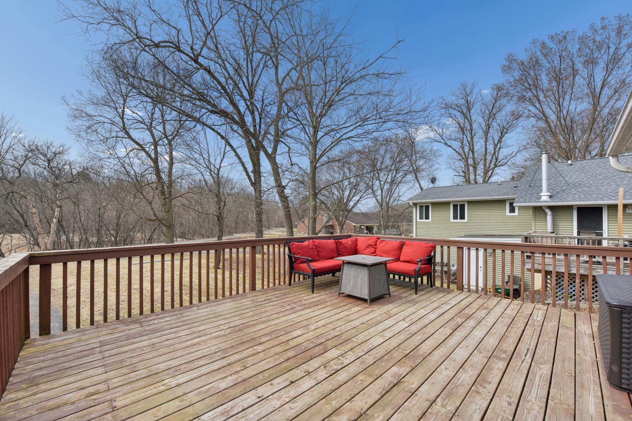 Large deck with views of Osceola Creek. The perfect place for that morning coffee.