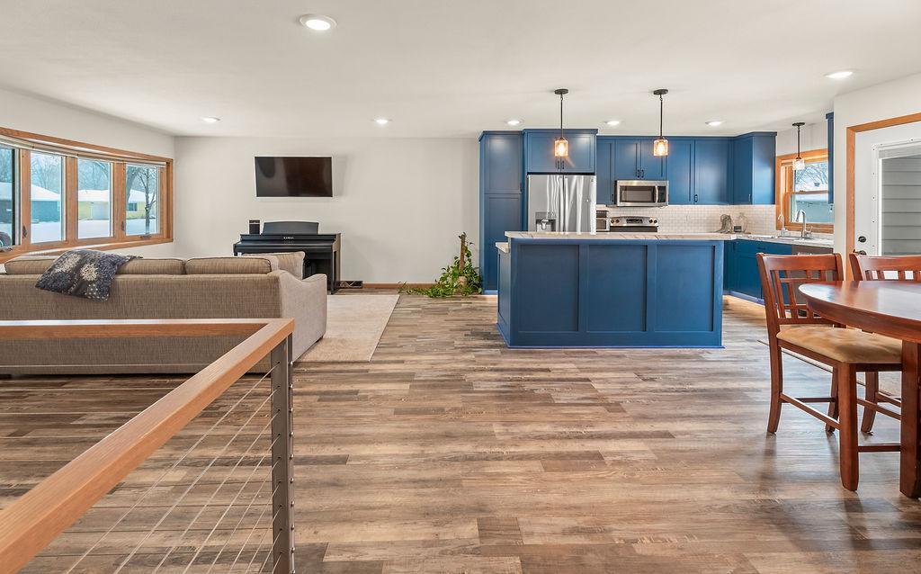 Vinyl plank floors & recessed lighting throughout
