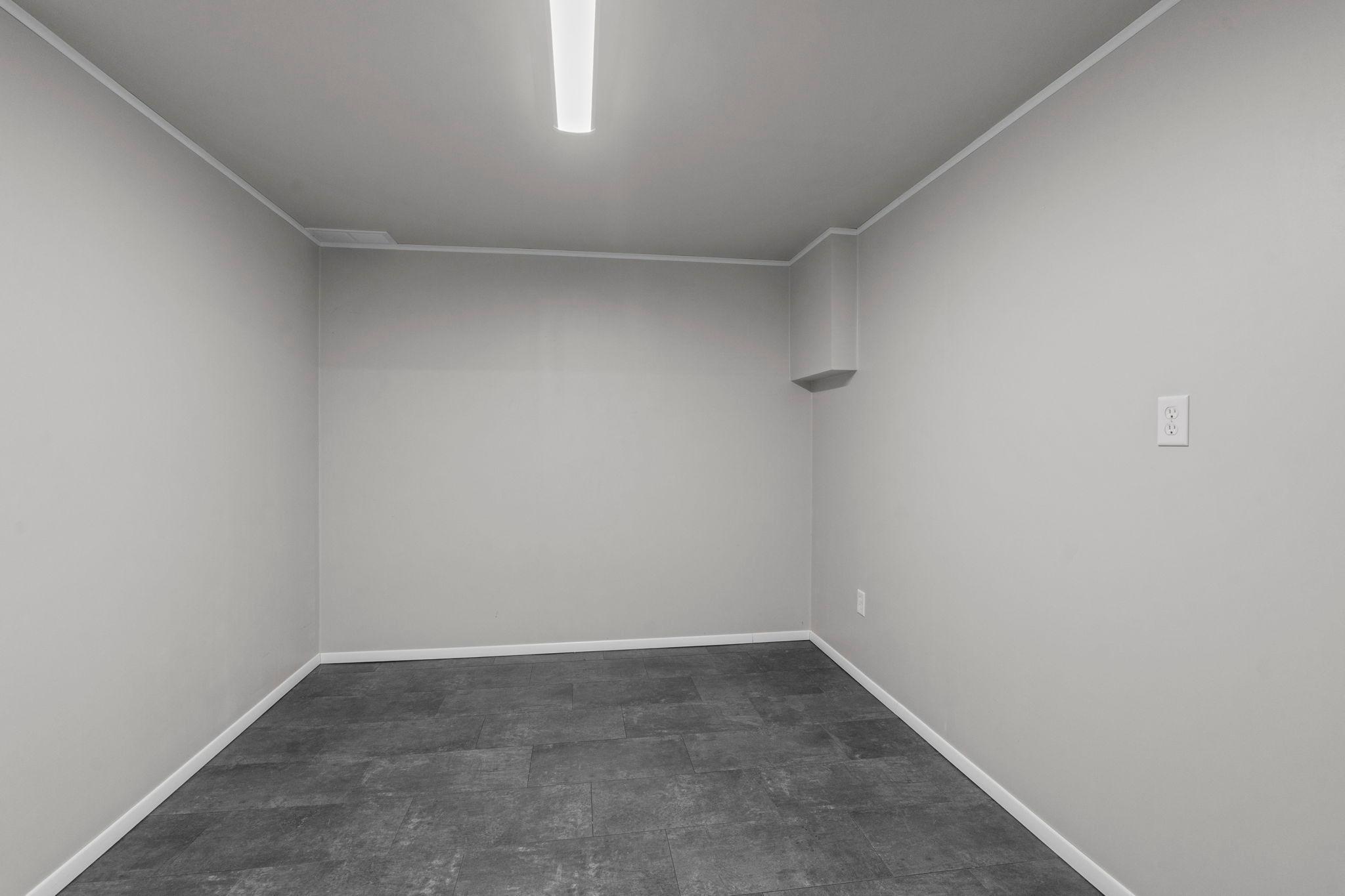 Lower level finished space is perfect for a home office, play area or workout room!