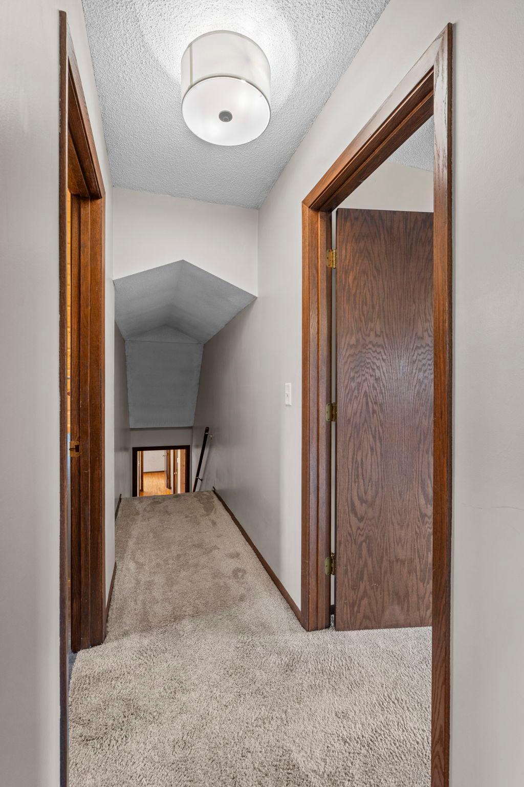 Upper level hall to your two bedrooms and full bath.