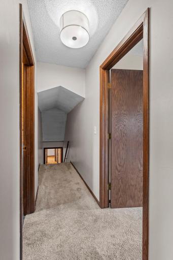 Upper level hall to your two bedrooms and full bath.