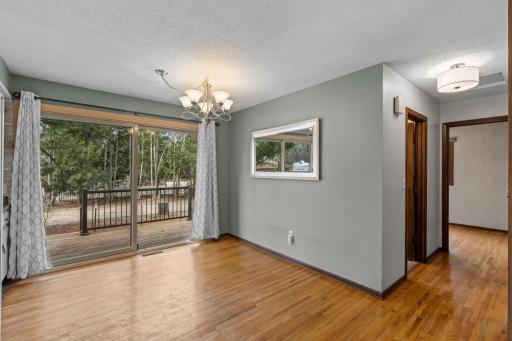 Living room is open to Dining Area with back deck access.