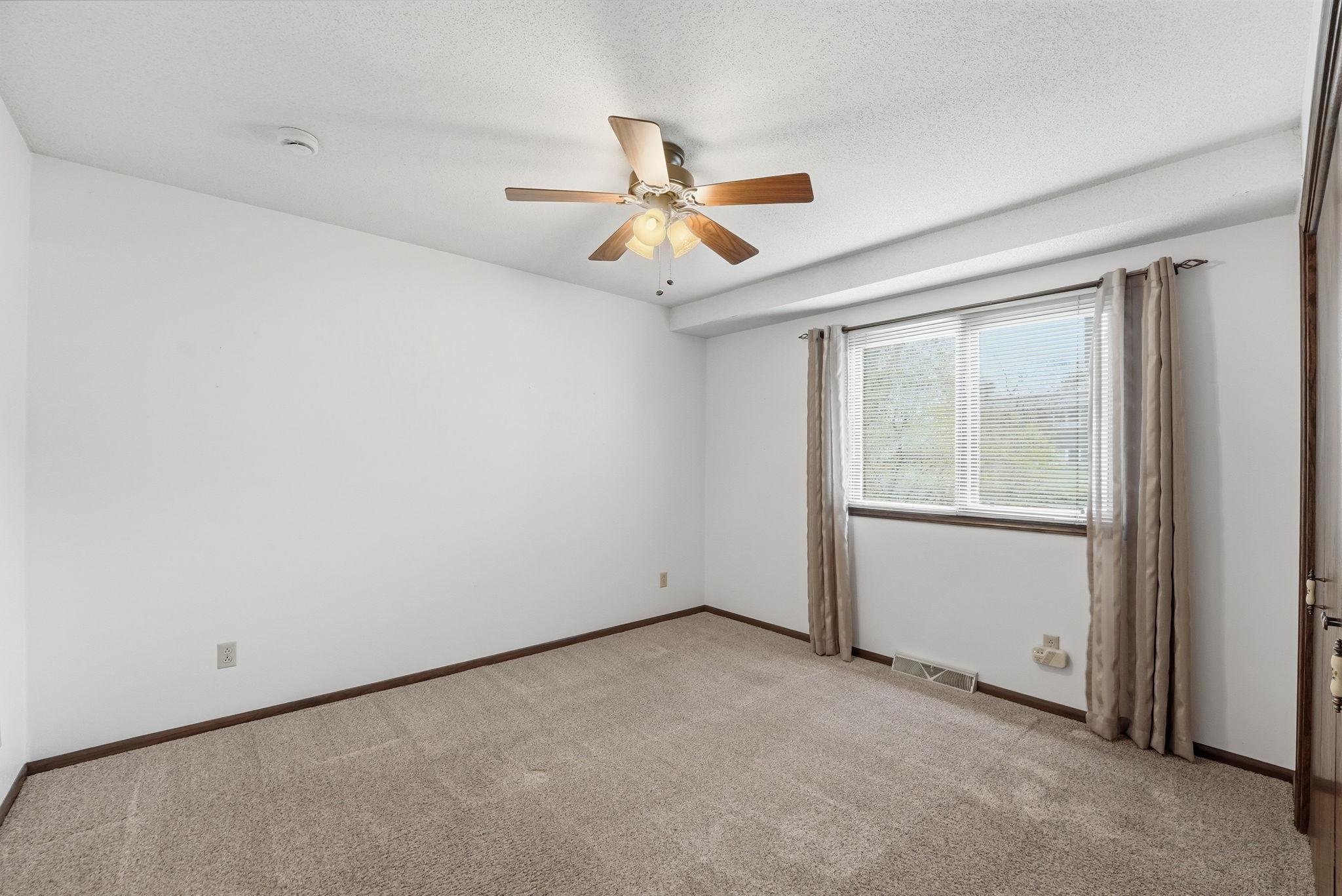 Main floor bedroom #1, conveniently located next to the full bath.