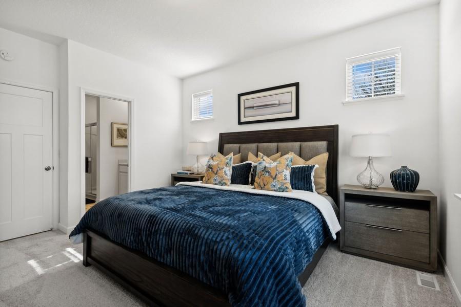 (Photo of a decorated model, actual homes finishes will vary) Find your retreat in this primary bedroom. Enjoy the exclusivity of a private bath and huge walk-in closet.