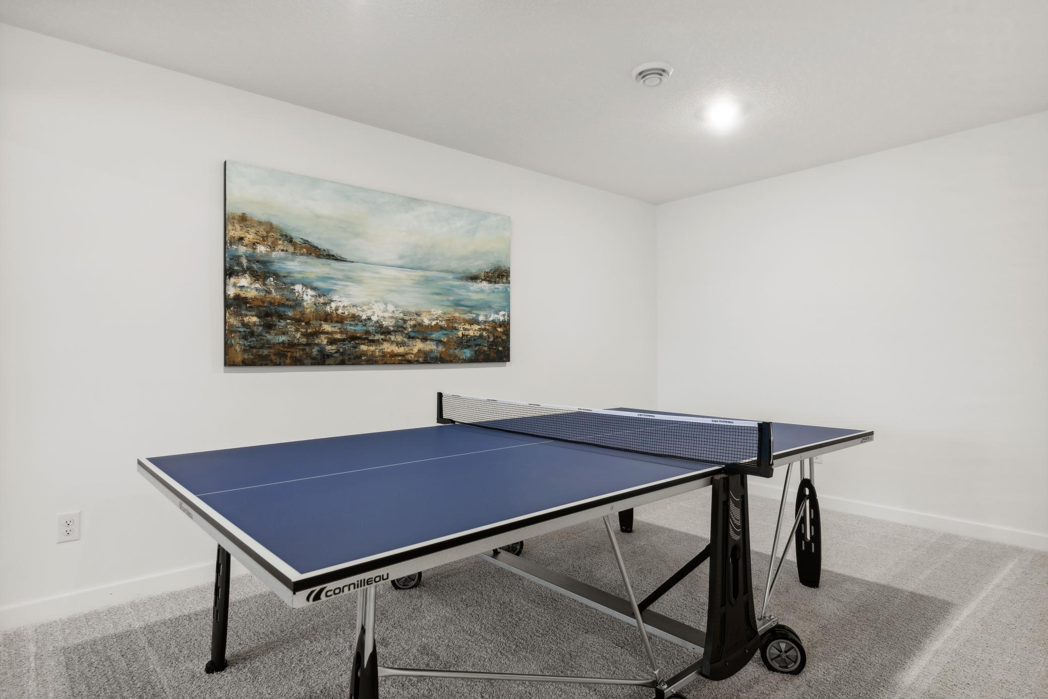 (Photo of a decorated model, actual homes finishes will vary) Another view of the recreation room.