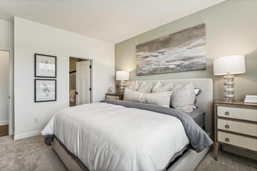 (Photo of a decorated model, actual homes finishes will vary) Find your retreat in the primary bedroom. Enjoy the exclusivity of a private bath and walk-in closet.