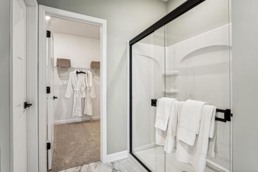 (Photo of a decorated model, actual homes finishes will vary) Another view of the primary bath.