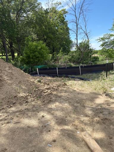 (Photo is of the actual backyard in progress.)