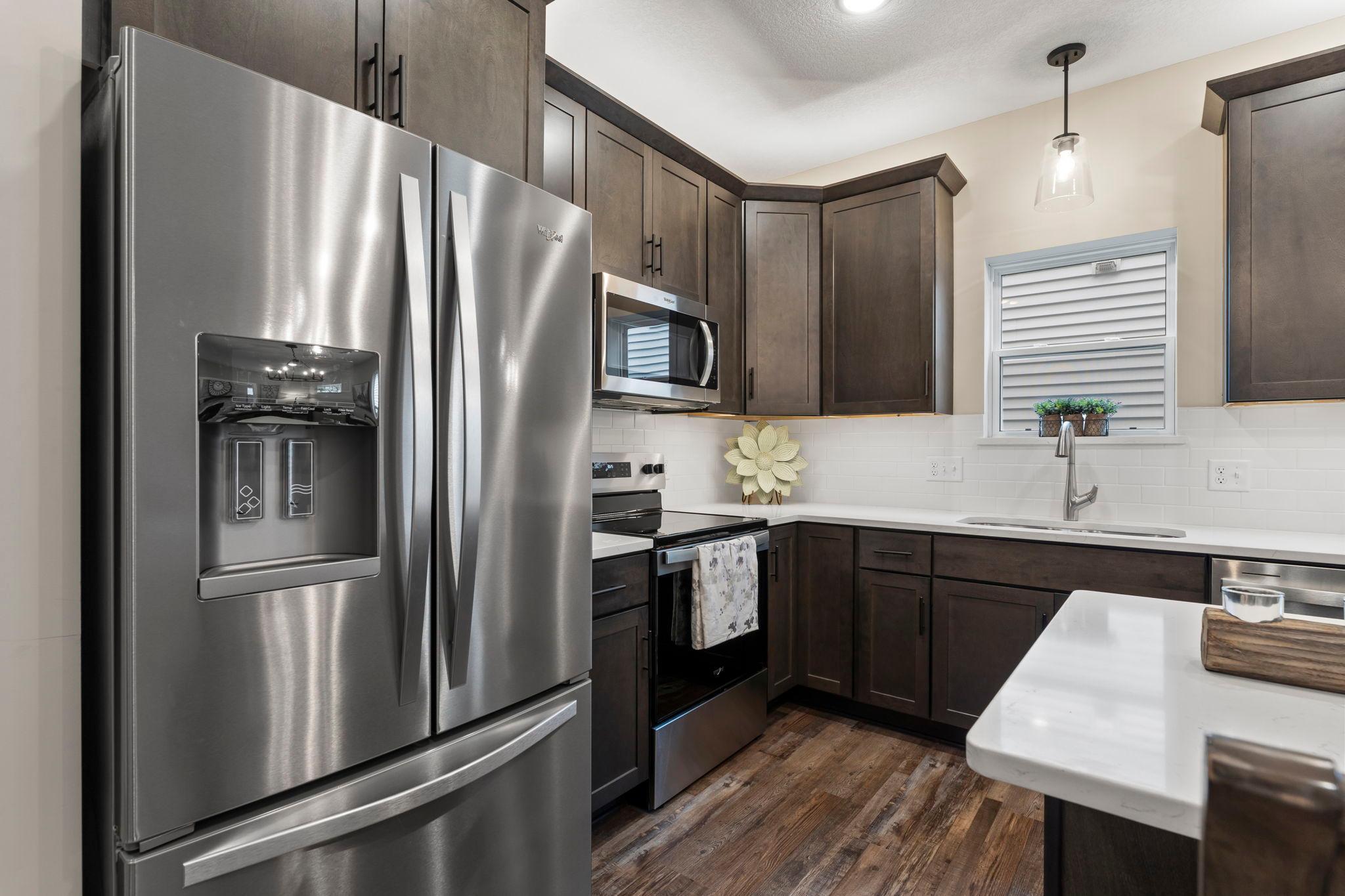 Stainless steel appliance package is included.