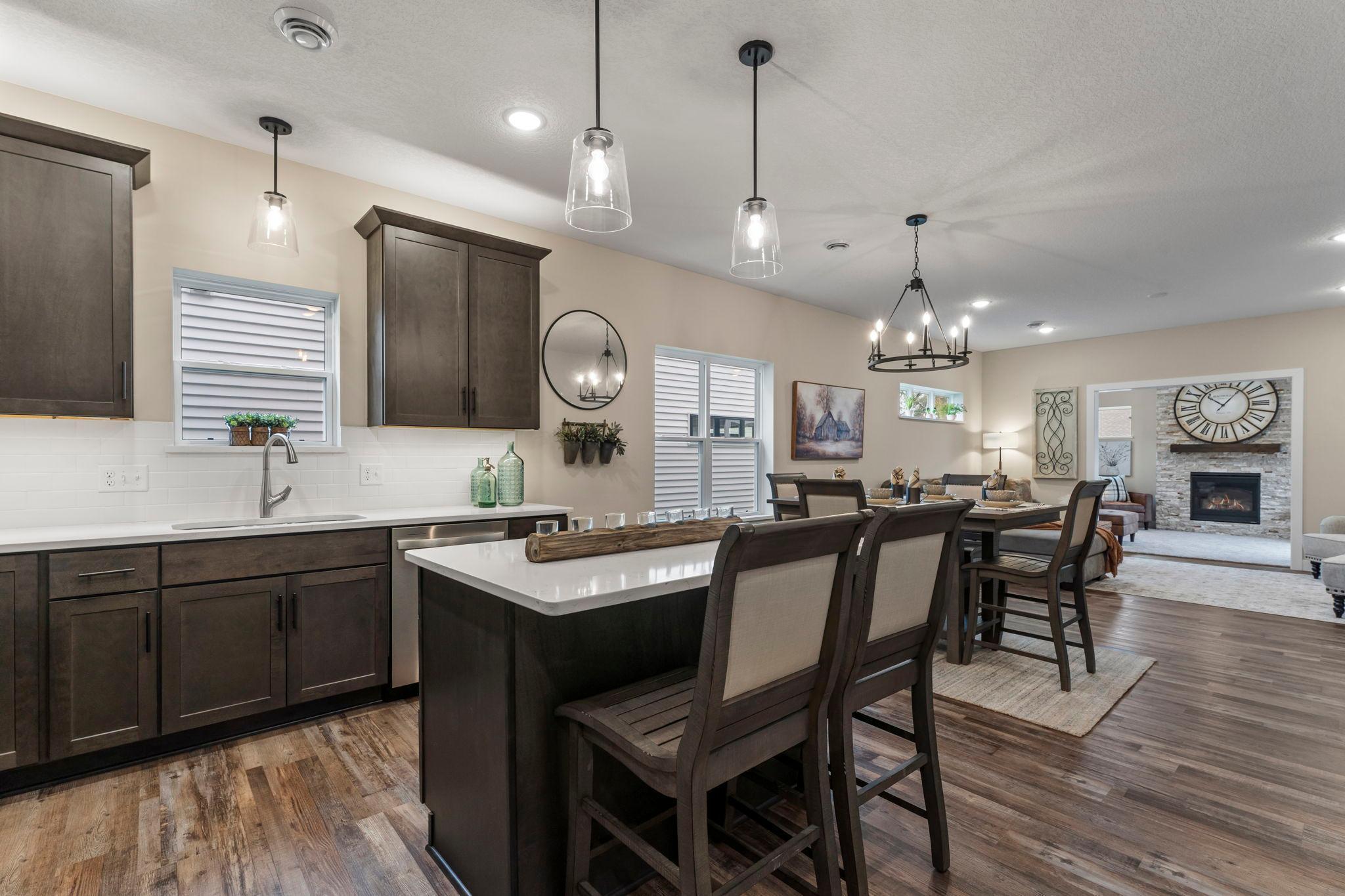 You will choose either enameled or stained cabinets and are welcome to do a mix of each. This house has white cabinets.