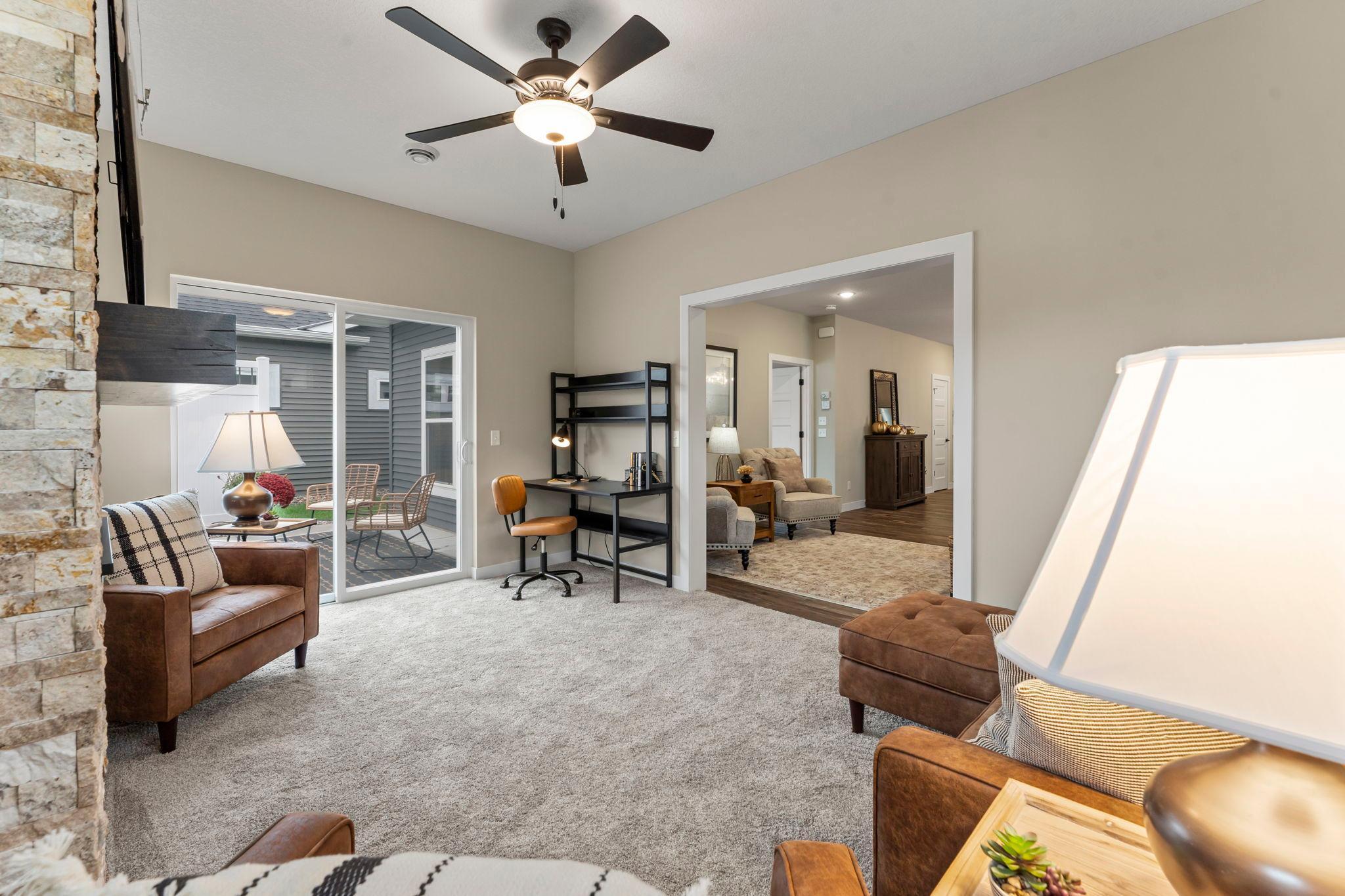 The sunroom also has plenty of space to set up an office area.