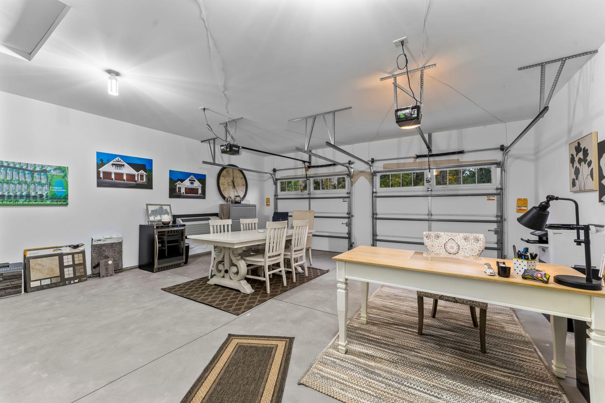 The 2 car finished garage is our office/sales center space.