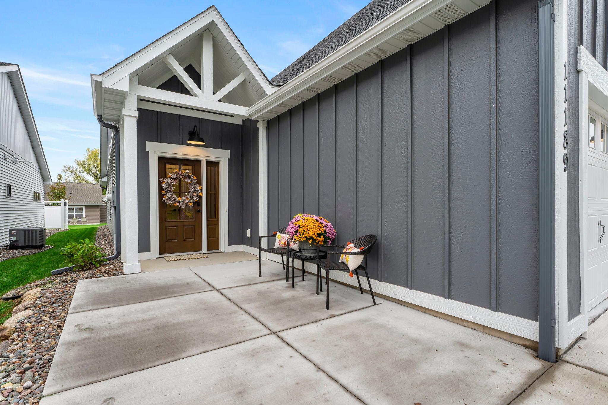 A decorative front door with side lite is included in all of our homes. The front walk way is large enough to have a second patio area. This community has lots of deer, geese, ducks, turkeys and even a fox.