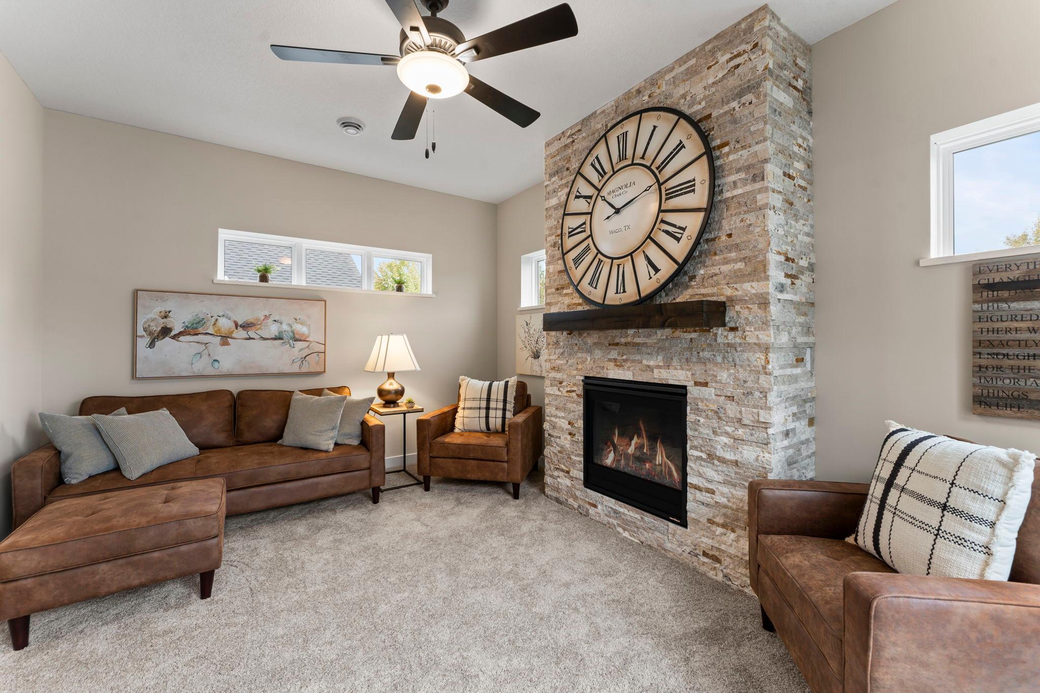 One of the options you will have is to include a fireplace. This one is located in the sunroom. We also offer a corner fireplace in the living room if preferred.