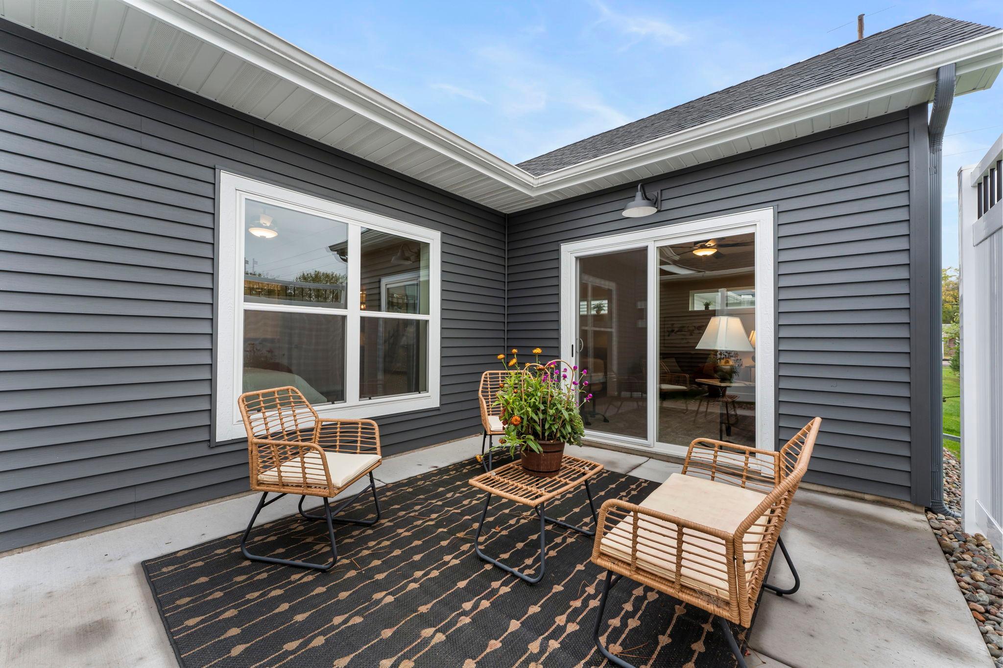 This is the back patio, plenty of space for cozy seating.