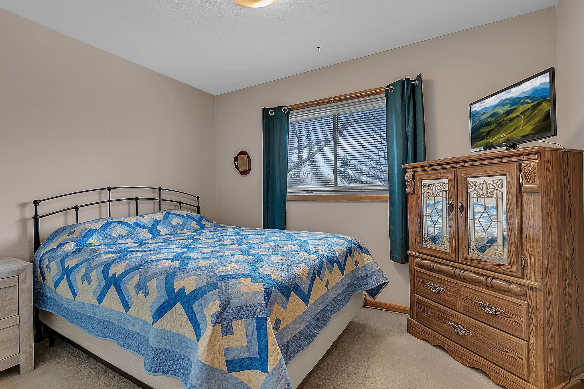 Another upper level bedroom.