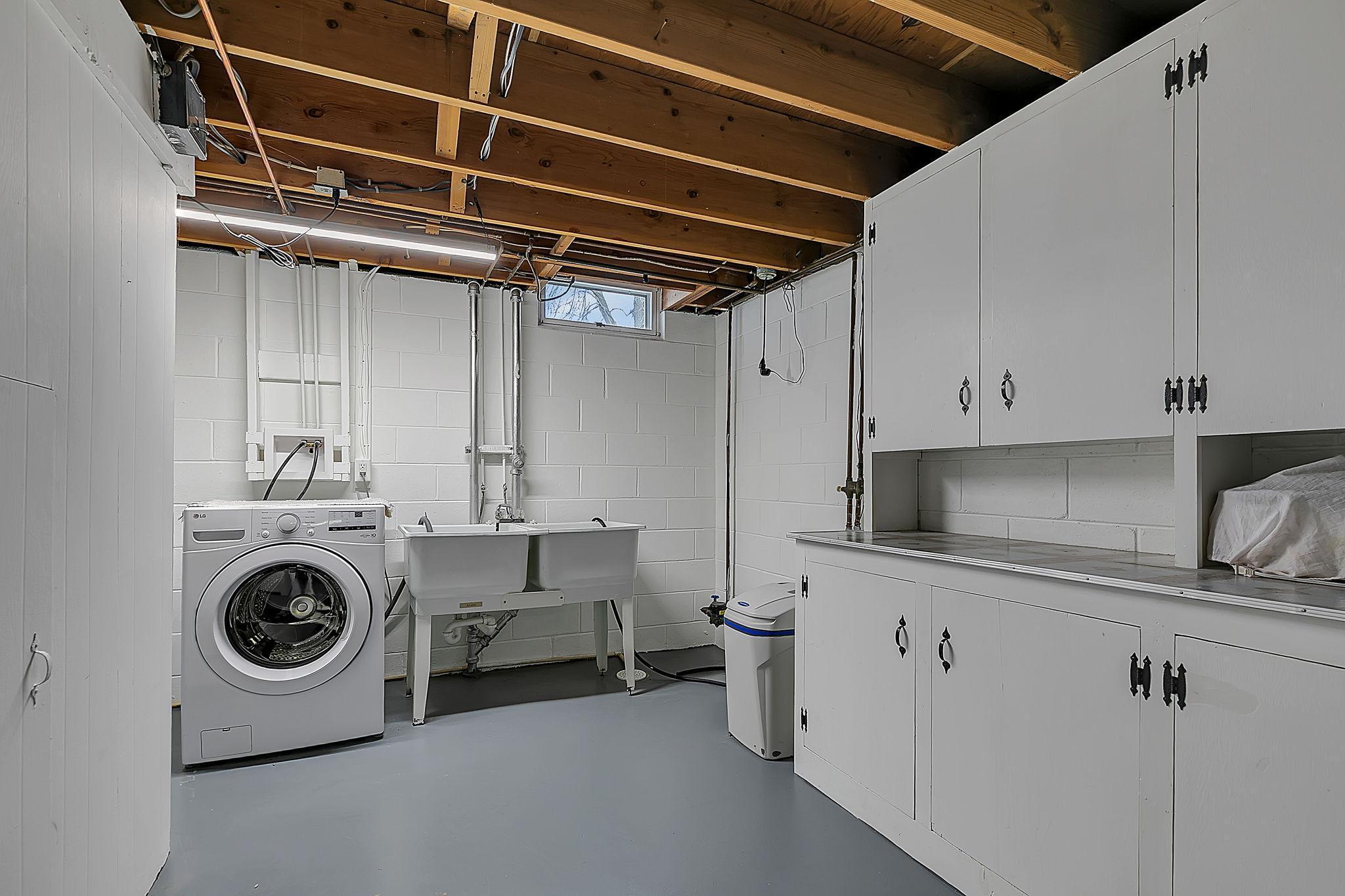 Lower level laundry room.