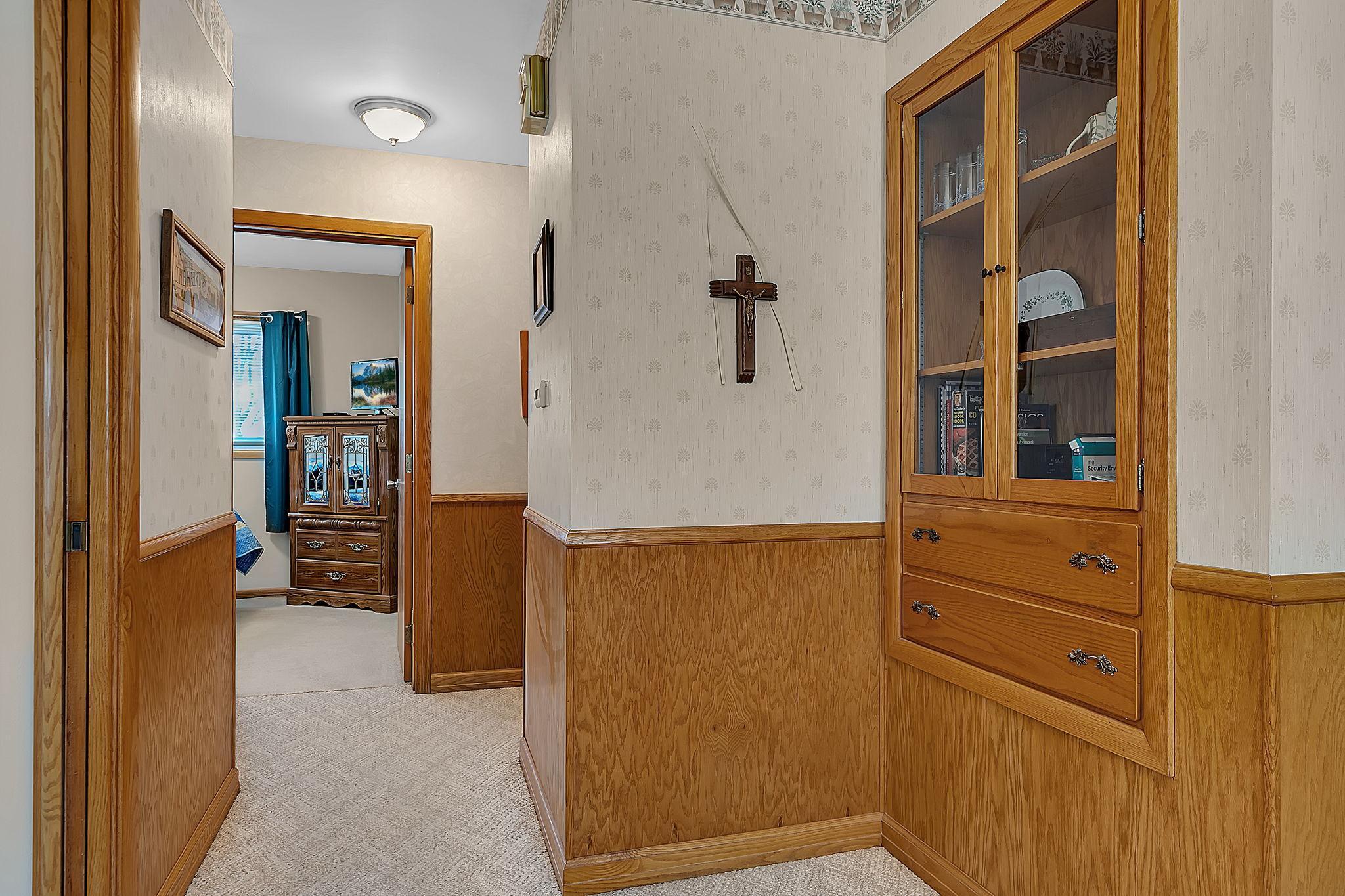 Appreciate the built in cabinetry for storage or decor.