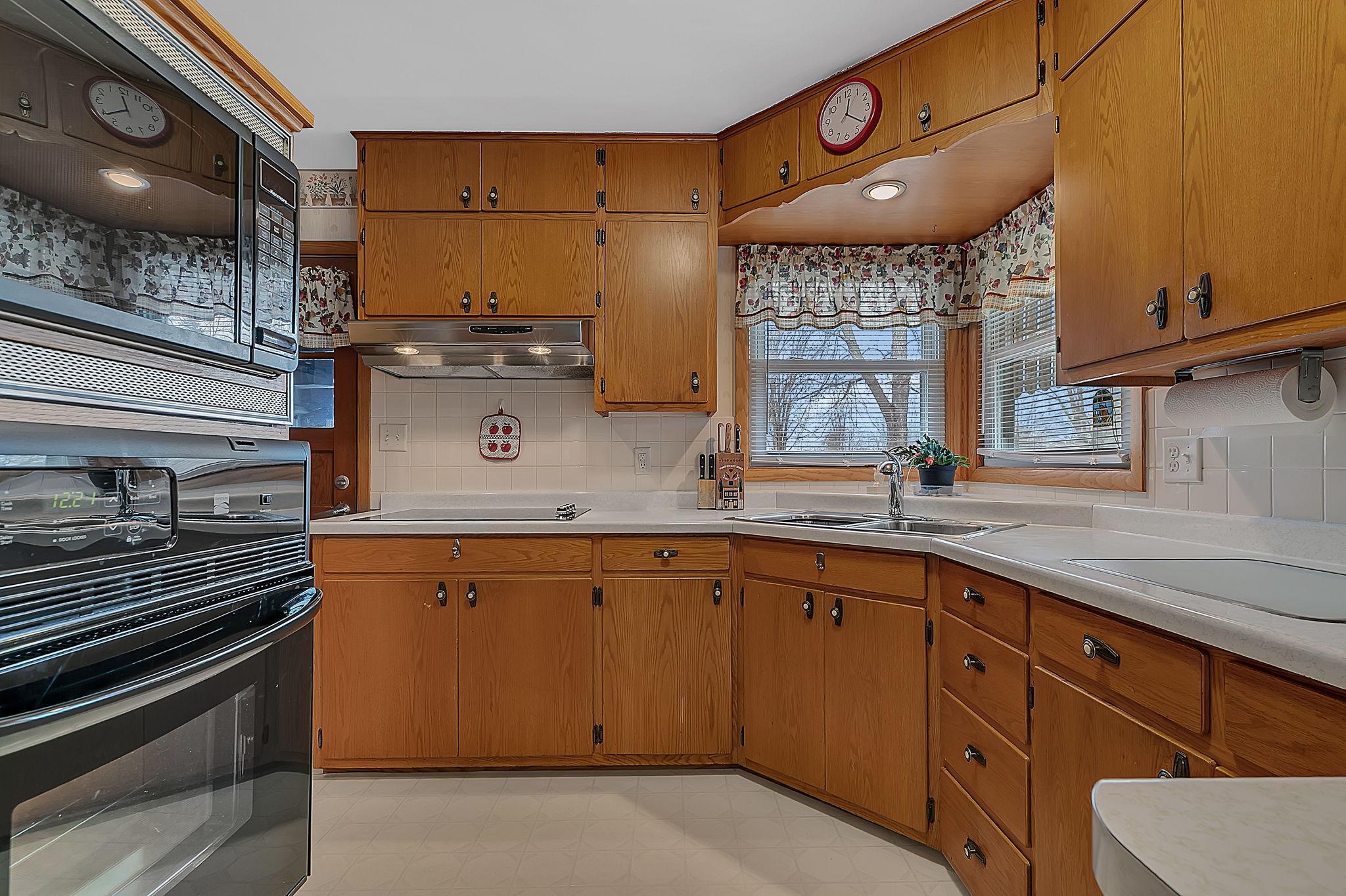 Kitchen has ample cabinetry for all your culinary needs.