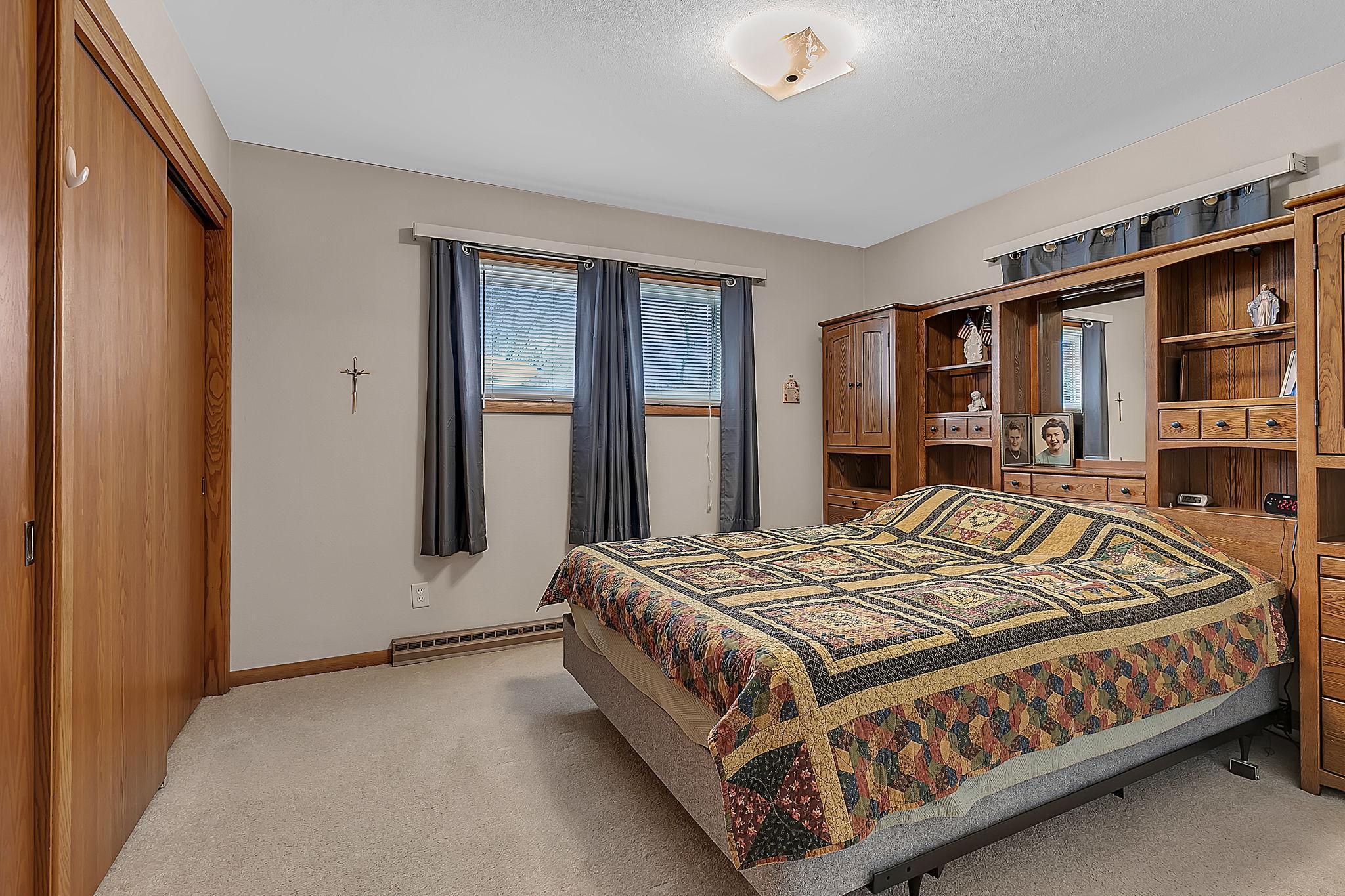 Spacious primary bedroom awaits your personal touch.