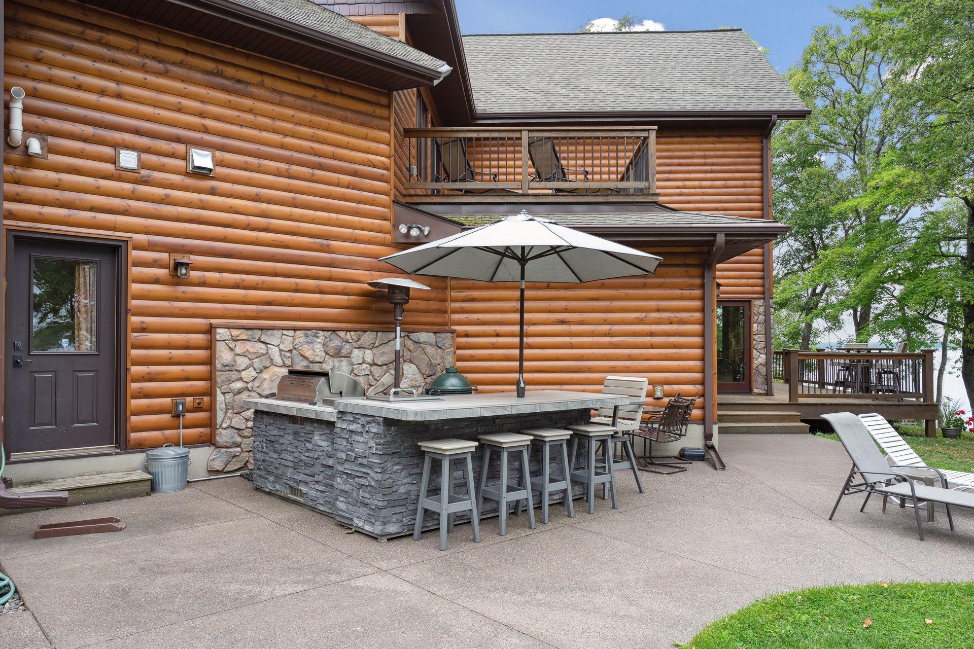 Imagine the ease of lakeside entertaining with a convenient outdoor kitchen