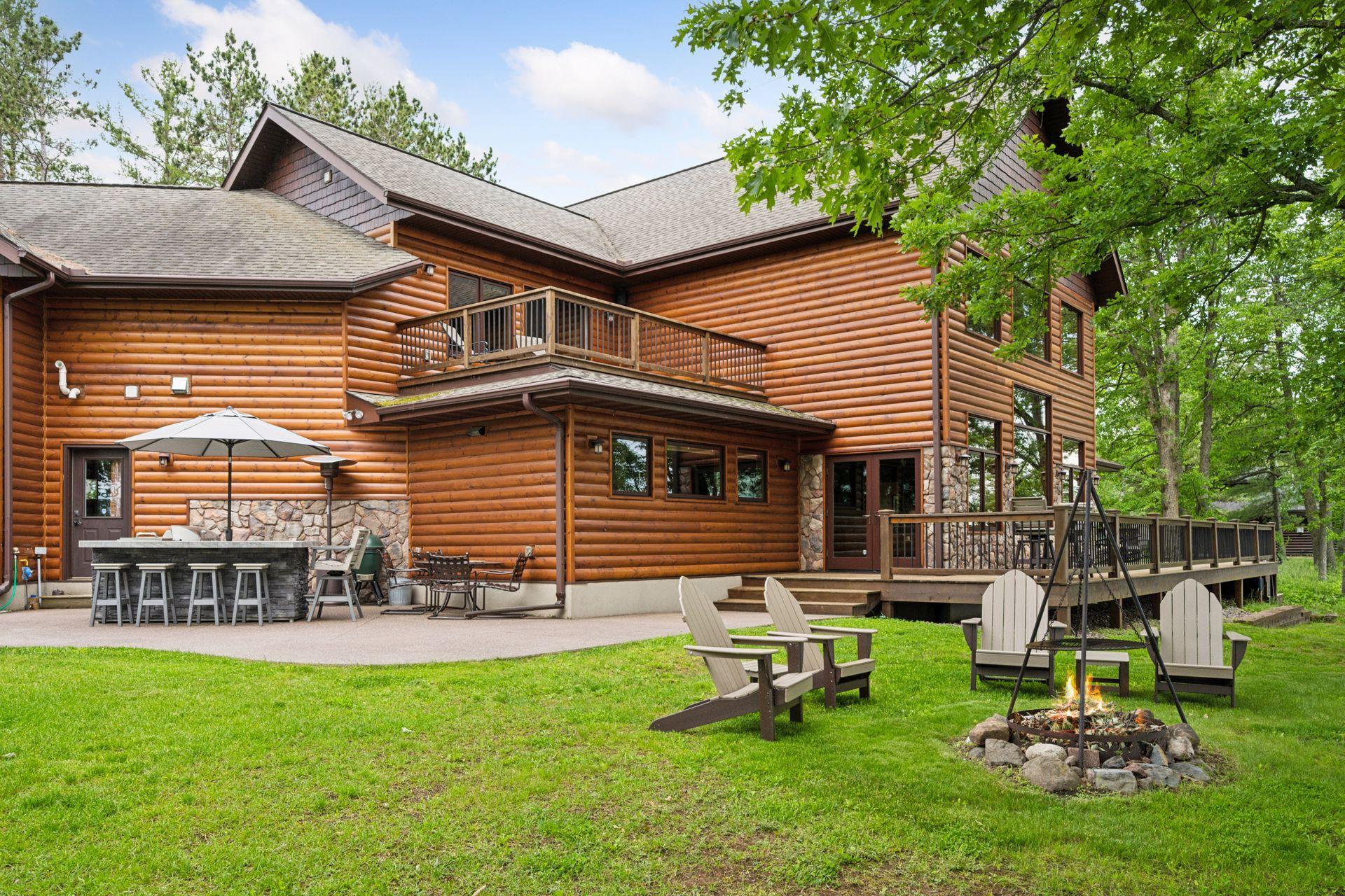 Plenty of room for yard games, sunbathing or a fire pit campfire in the yard between the main house and garage/bathhouse