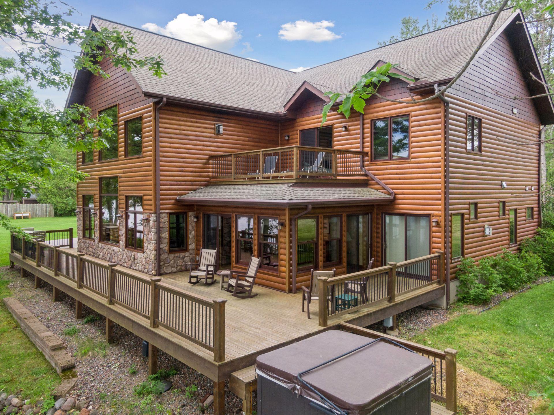 Wrap around deck and hot tub are great spots to enjoy lake views