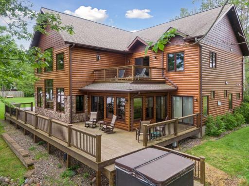Wrap around deck and hot tub are great spots to enjoy lake views