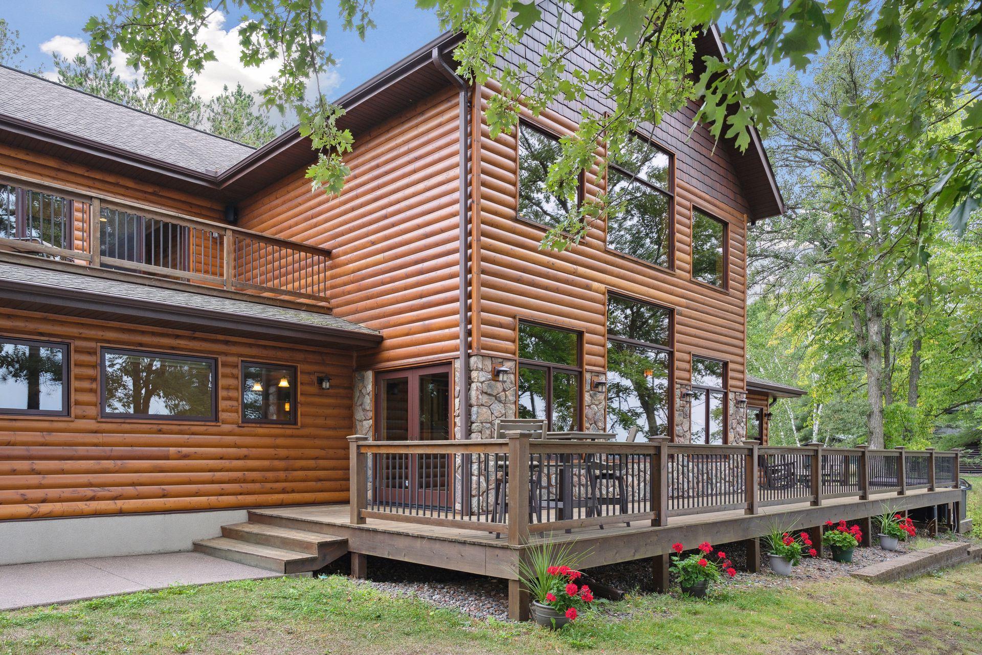Large wrap around deck overlooking the lake is easily accessible from most rooms on the main level