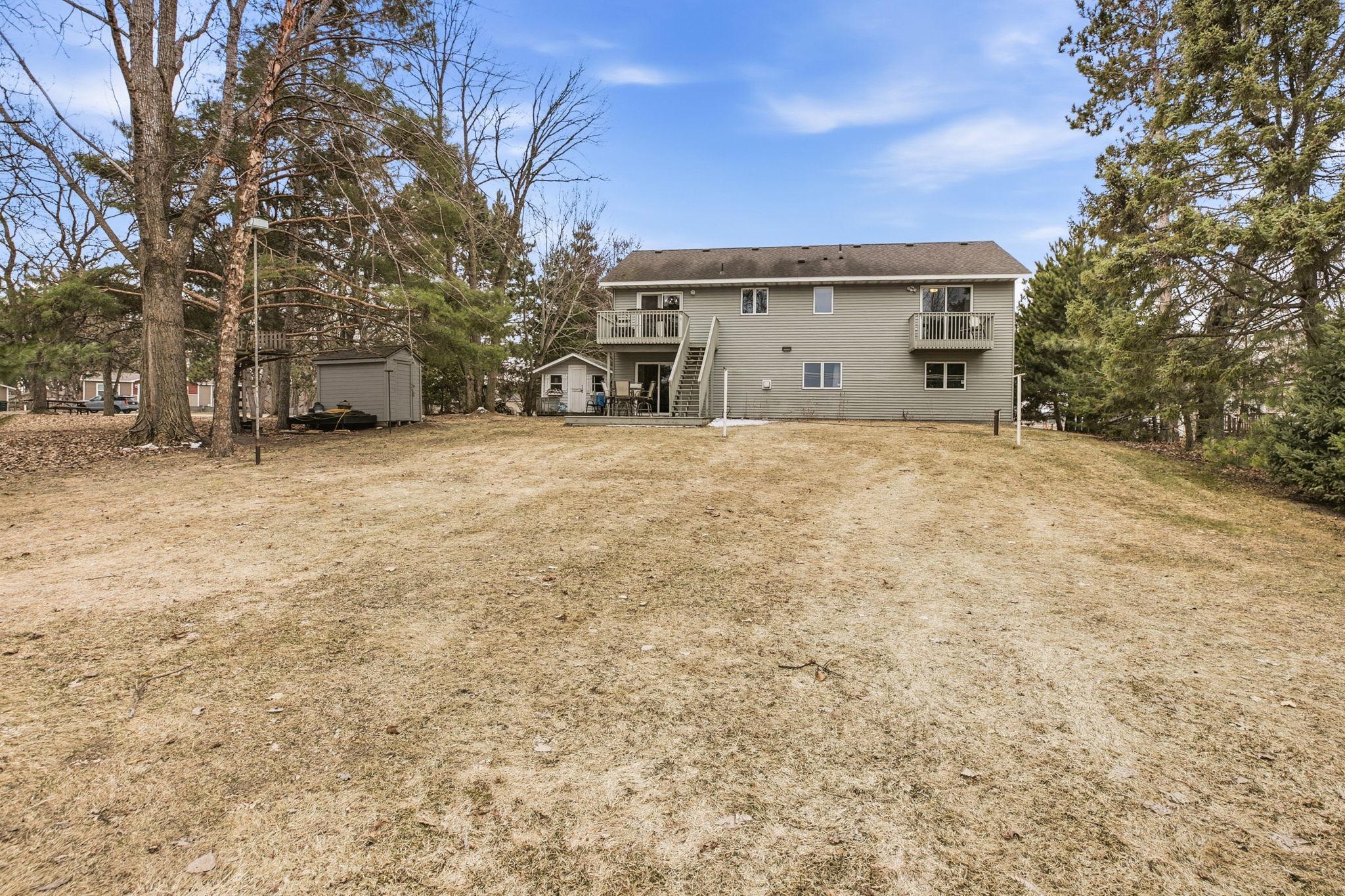 Large yard ideal for entertaining, outdoor dining, and summer activities.