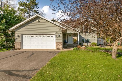 2 stall garage with driveway space for multiple vehicles.