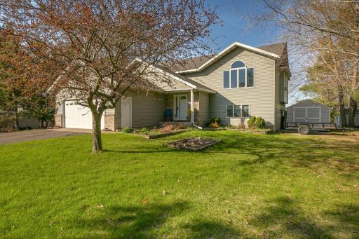 Well-maintained yard with room for gardening, play, or relaxation.