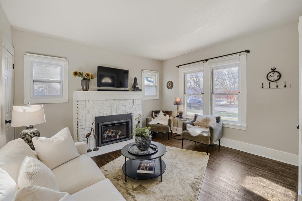 The living room is light and bright with hardwood floors!
