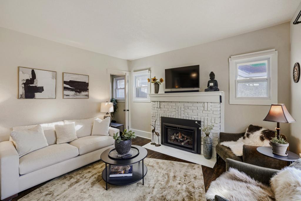 Enjoy relaxing by the fire with your favorite book in this cozy living room. The gas fireplace is easy to enjoy anytime with a simple push of a button!