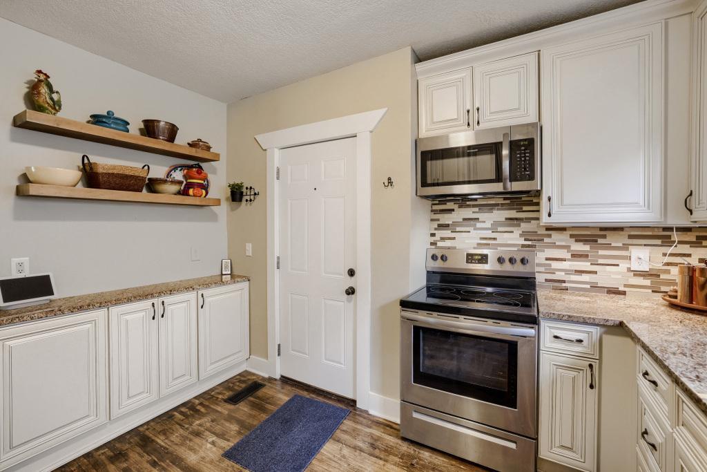 Additional kitchen space and access to the backyard.