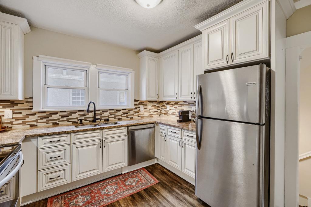 You will love the space in the updated. Note the hardwood floors, stainless-steel appliances and double windows over the sink!
