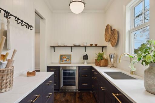 Bright, walk-through Butler's pantry
