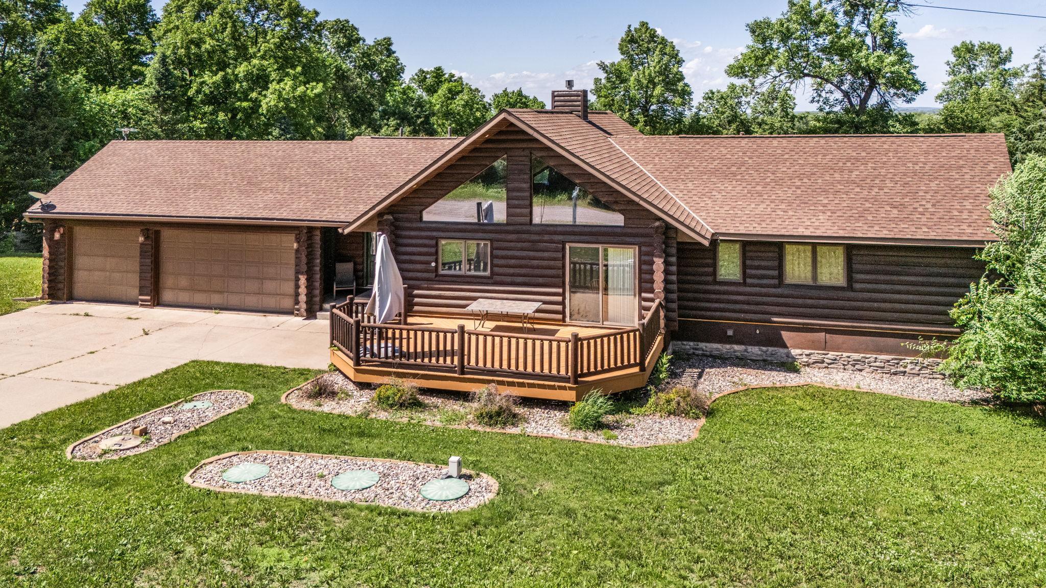Front porch creates another outdoor living area.