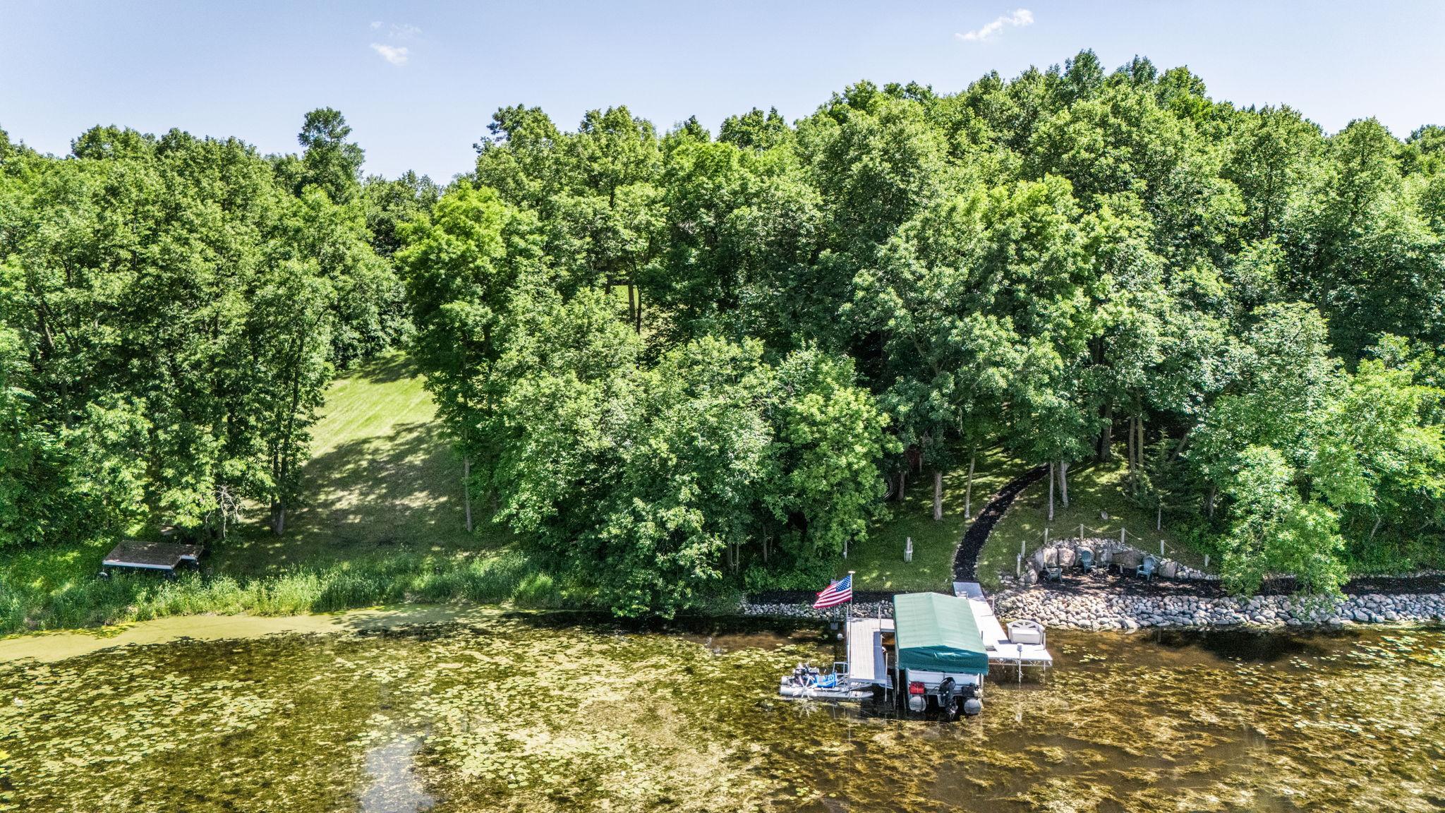 Drone footage highlights the home&rsquo;s prime waterfront setting and scenic views.