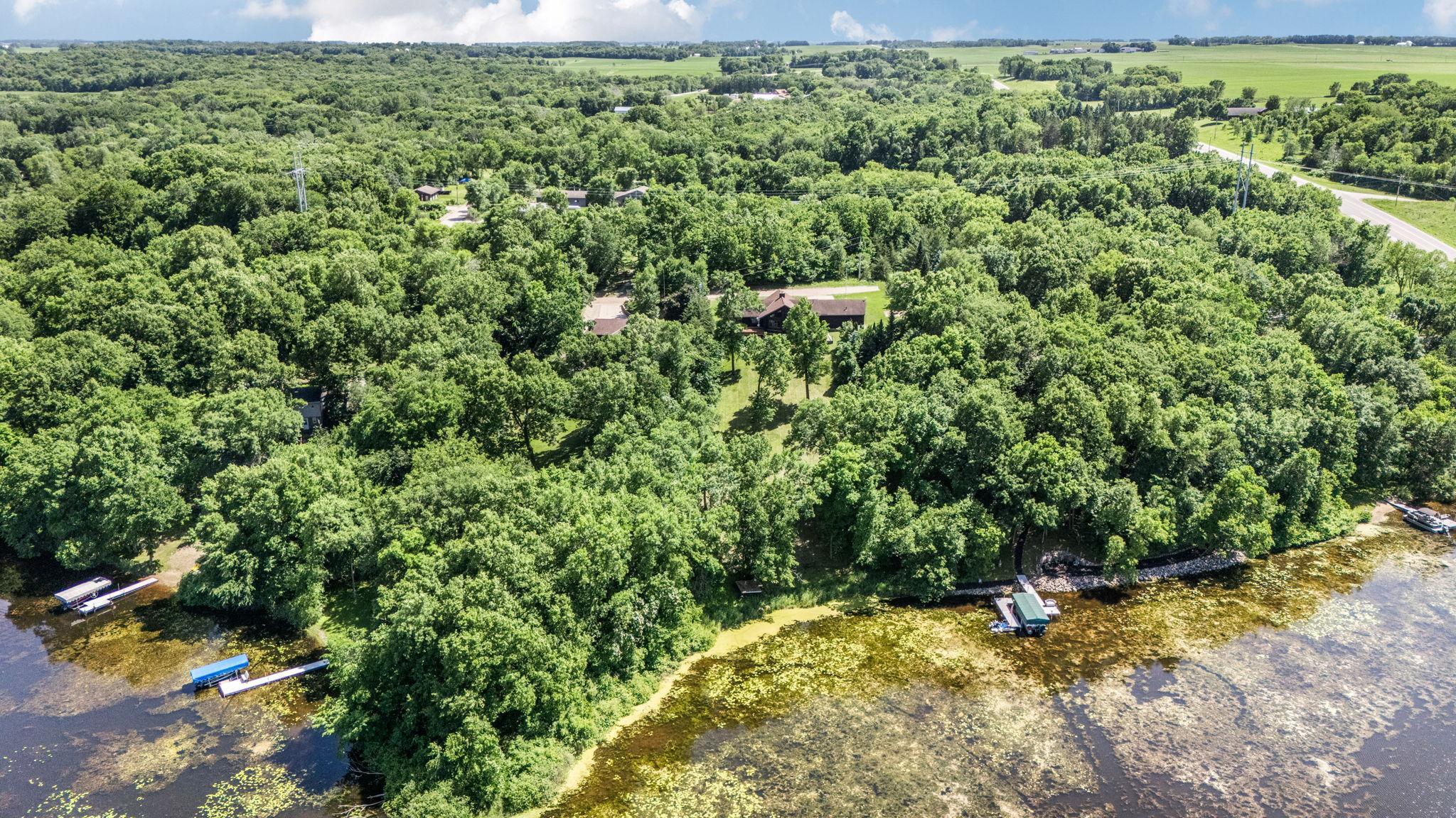Drone images showcase the home&rsquo;s placement on the lot and outdoor spaces.