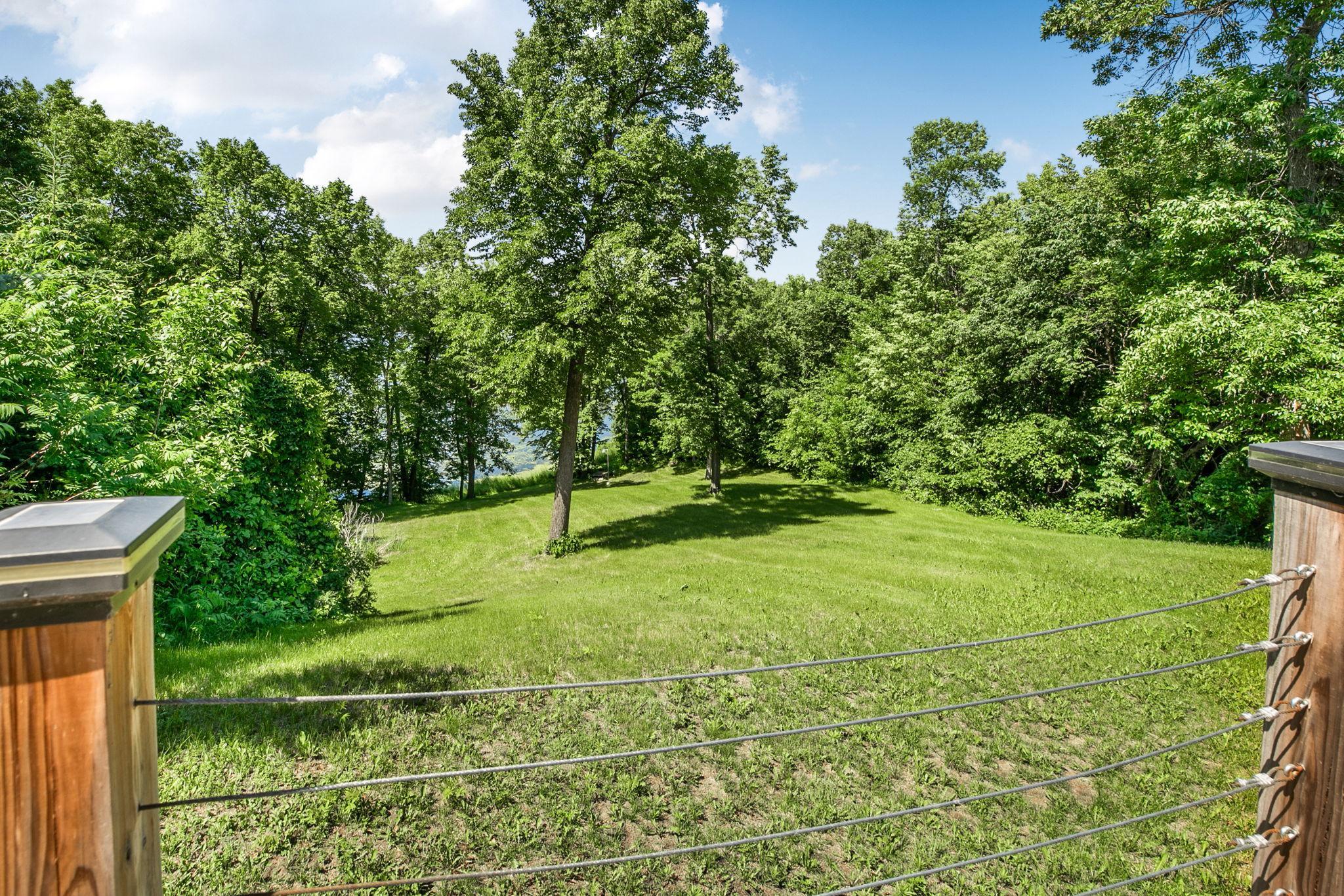 Tree lined back yard creates a sense of privacy.